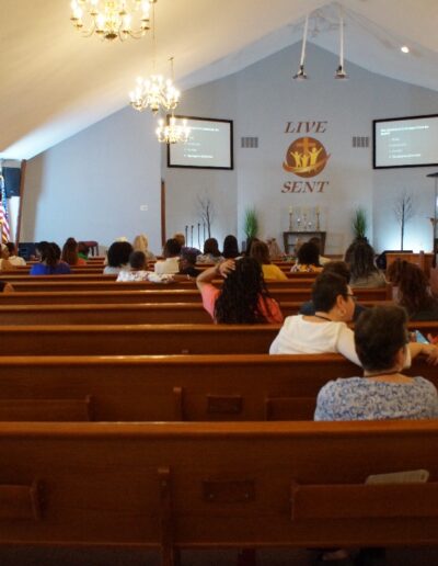 chapel image from the rear with women seated