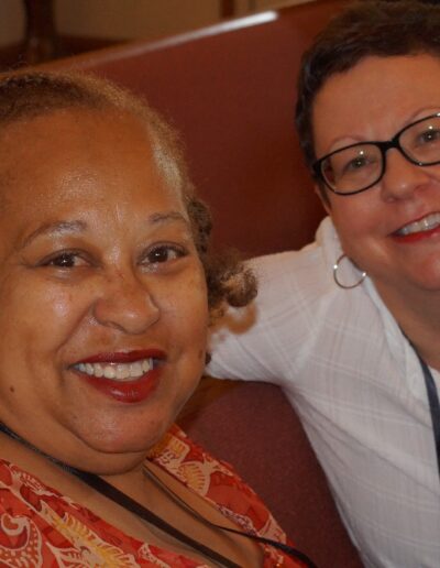 two women attending a meeting